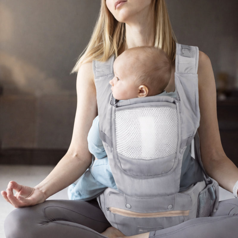 Porte-bébé modulable avec siège intégré